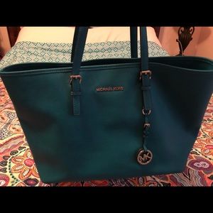 Authentic turquoise Michael Kors Purse